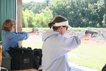 Editors Paige Eissinger and Barb Baird spend time at the range together. Photo by Gwen Cox.