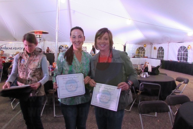 Thompson Center Arms' Brand Manager, Danielle Sanville, and I got our Annie Oakley Awards, and boy, we were proud of that in true Wyoming hunting spirit: 1 shot, 1 kill.