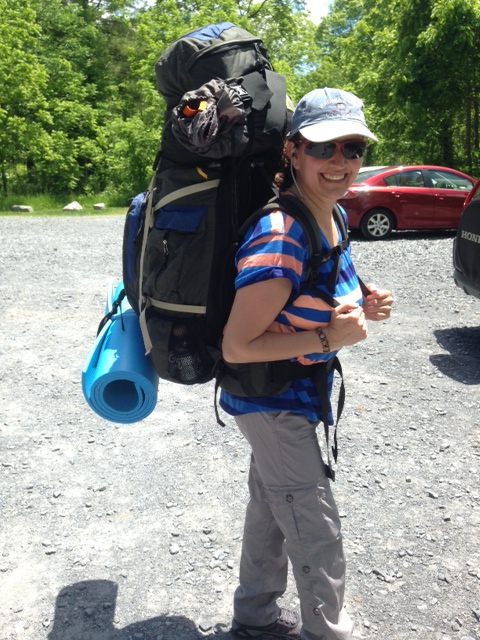 Woman hiking backpack june