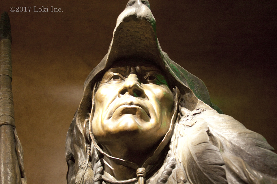 Distant Bronze Native American sculpture WOW museum