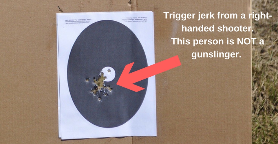 Trigger jerk from a right-handed shooter. This person is NOT a gunslinger.