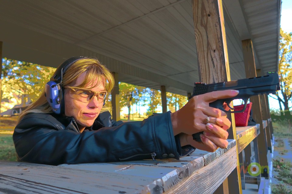 See HidingHilda in the background while Jennifer spends time with the new Smith & Wesson M&P 40.