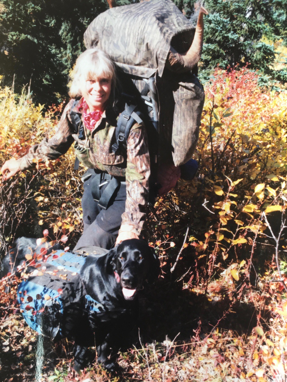 Sue Entsminger and pack dog, Midnight. She was an awesome super dog.