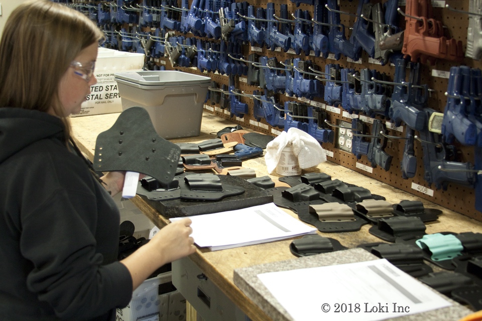 Filling orders at Crossbreed Holster factory