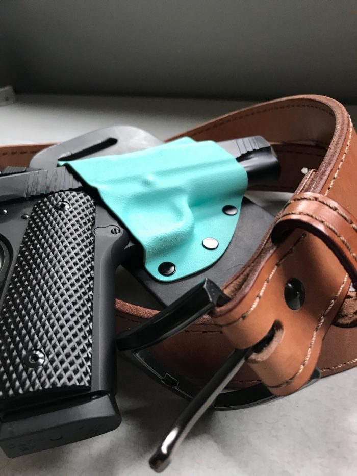 Crossbreed holster and gun belt