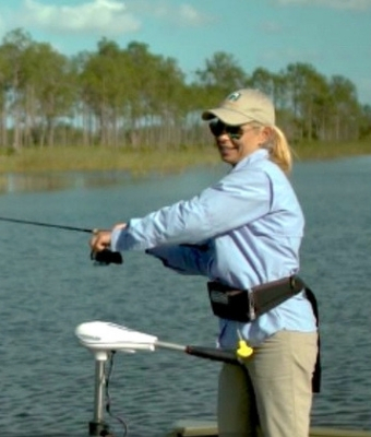 feature woman fishing rod