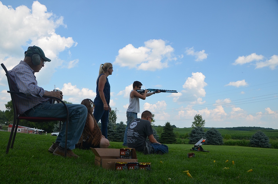 Family shooting together Plinking party