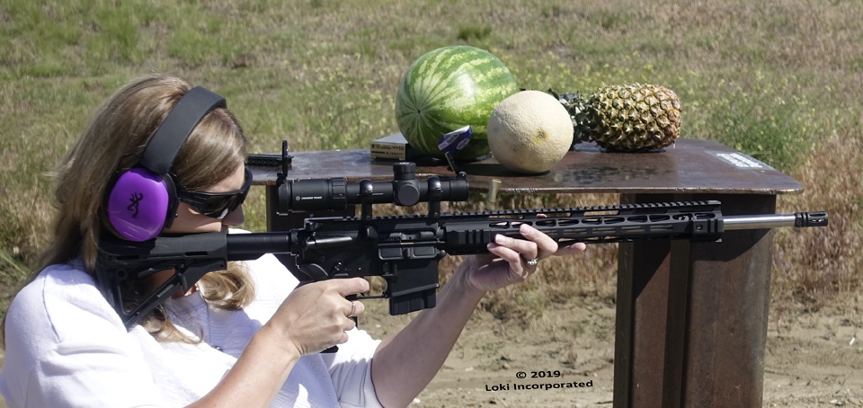 Ashlee Lundvall shooting fruit on range 224 Valkyrie Federal Premium 