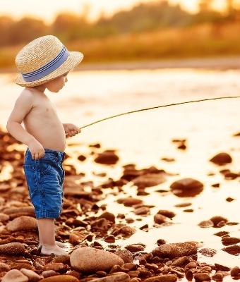 little boy with fishing pole