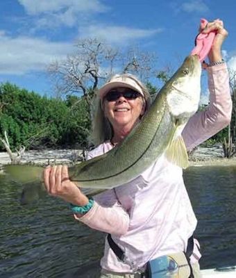 Ladies School of No Fishing woman with fish