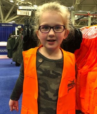 Little girl in orange vest in feature on Hunt S.A.F.E. NSSF