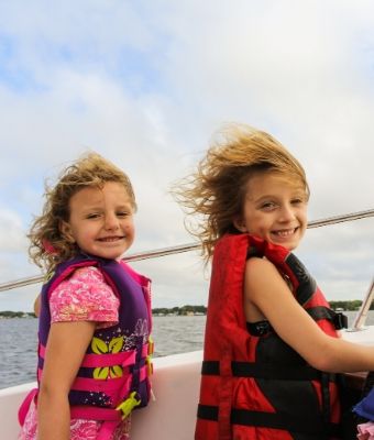 kids on boat feature