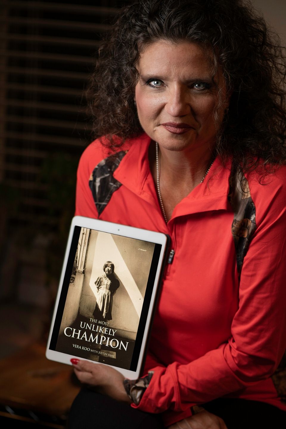 Jennifer Hansen Reviews Vera Koo's Book, The Most Unlikely Champion.