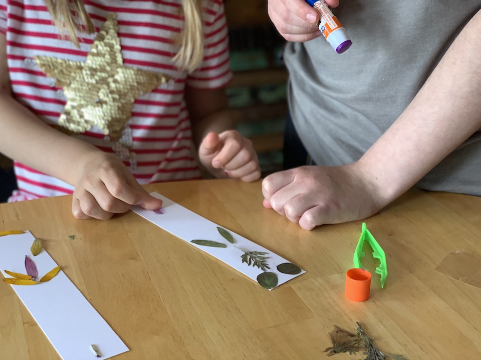 glue petals to paper bookmarks