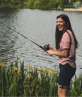 Woman fishing Feature