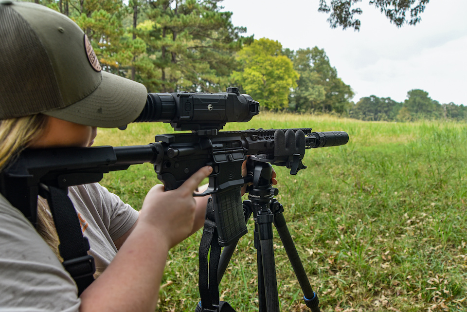 Woman Shooting AR Pistol