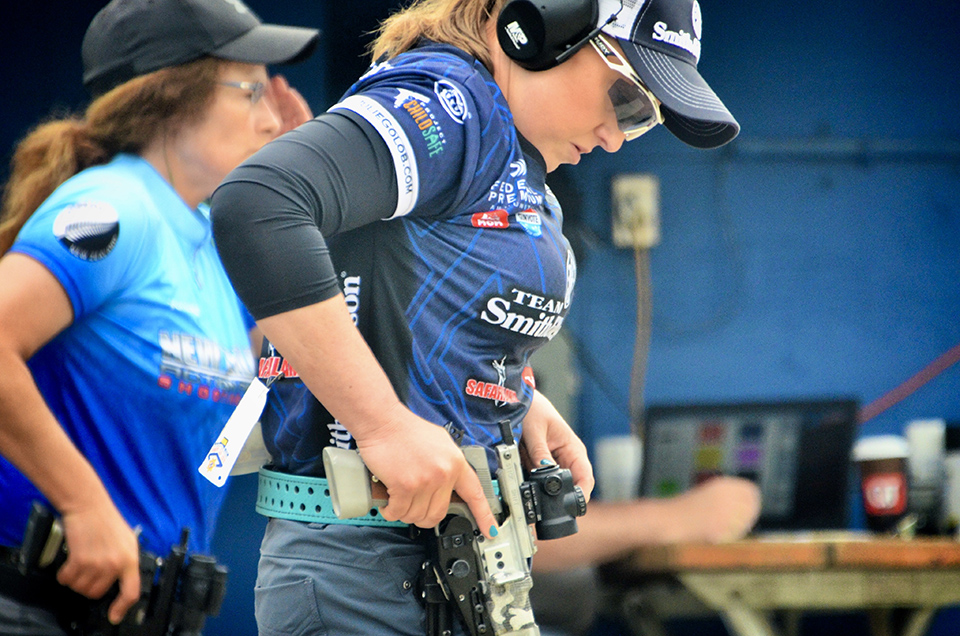 Julie Golob prepares to shoot a string of fire at the Bianchi Cup