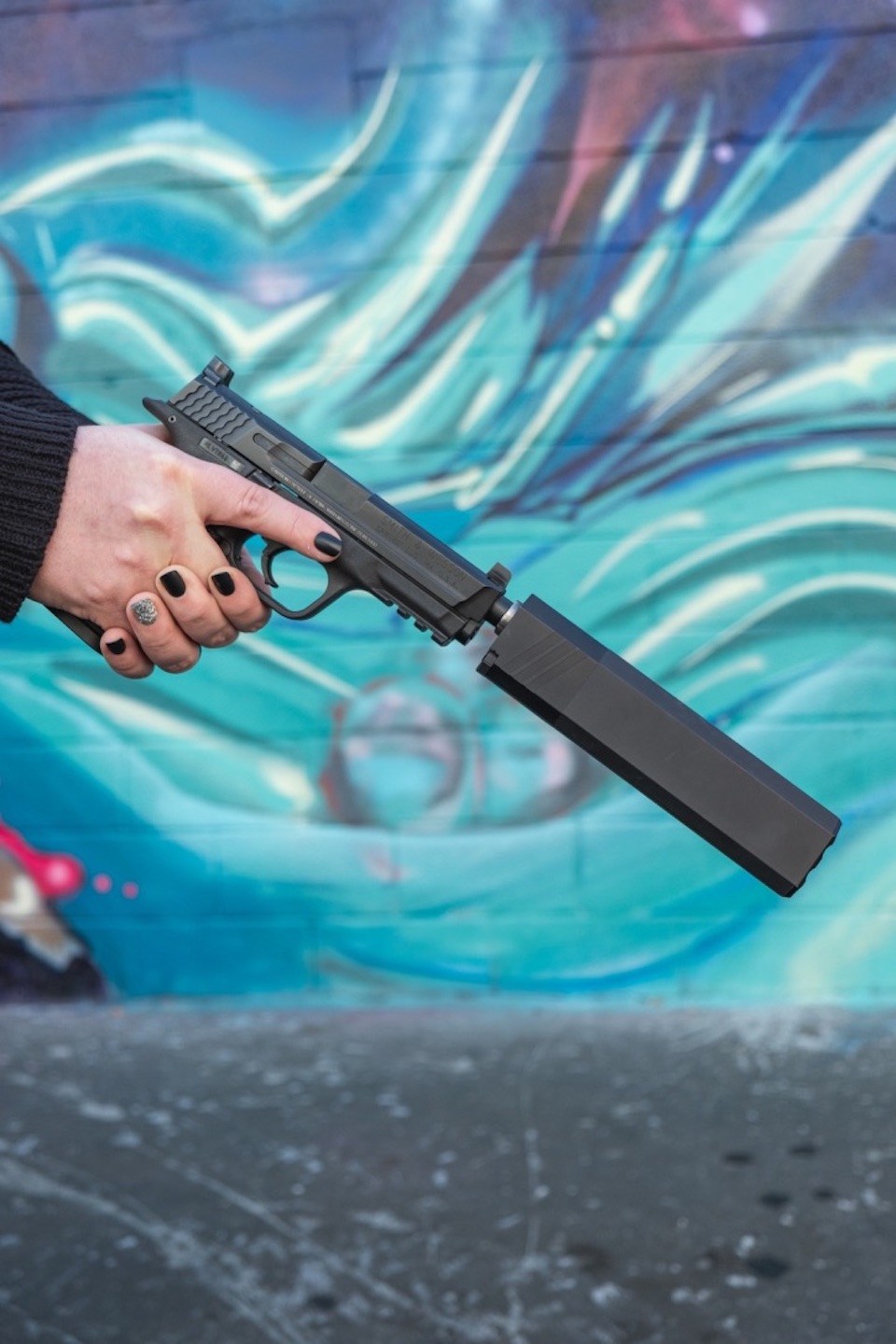 Justin Smith Photo -Smith & Wesson with SilencerCo Suppressor