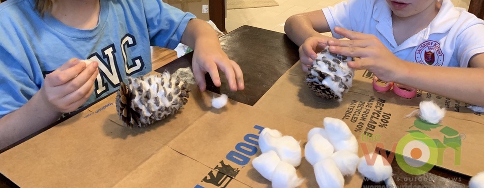 kids with pine cone snowy owl craft