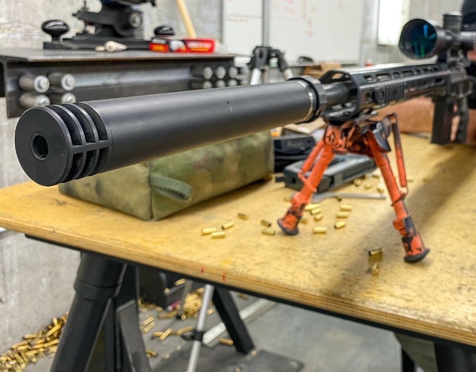 Suppressor on rifle SilencerCo POI Shift