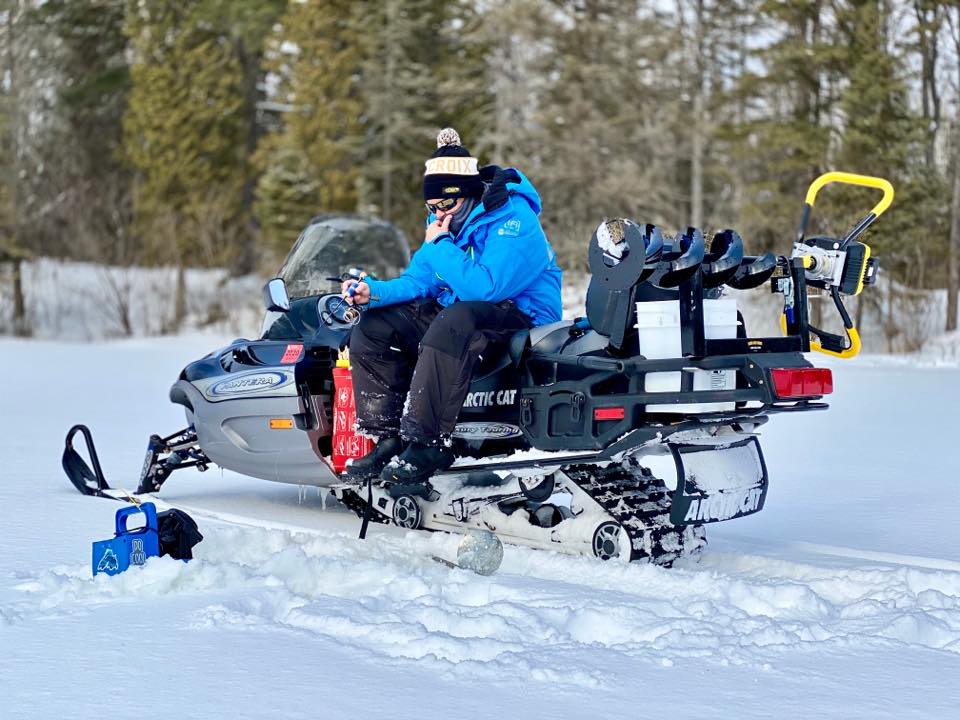 B C on snowmobile