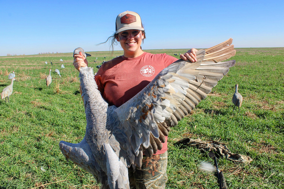 Jessica white with Sandhill Crane