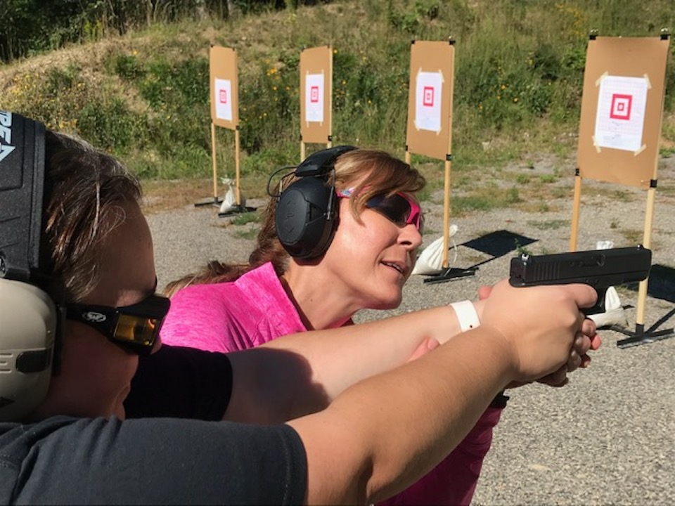 Kelly teaching with Glock ARMED and Feminine Photo cred Tammy Glavach