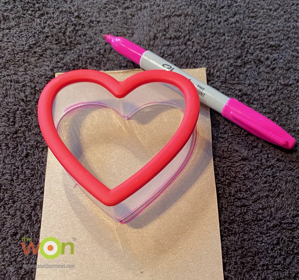 pen and heart cutter