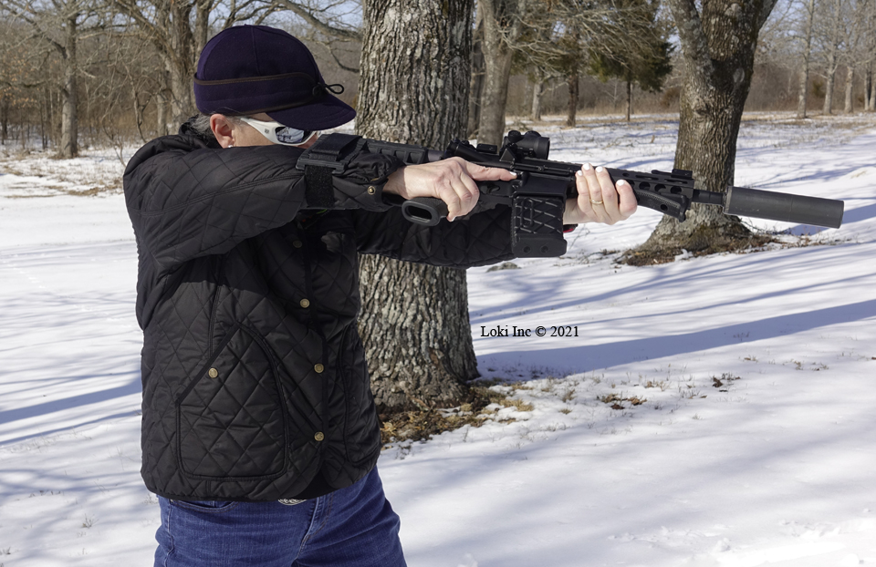 Barb w AR pistol 300 Blk w SilencerCo Omega 300 ready to fire using brace