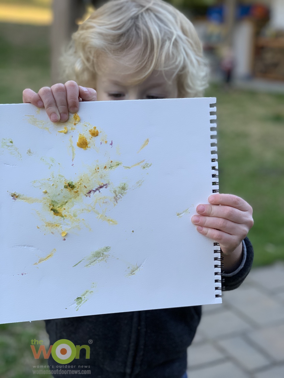 boy with pounded flowers craft