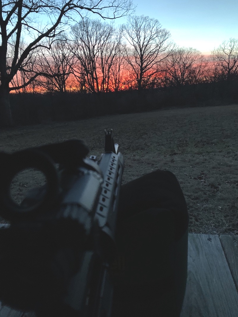 on the range at sunset with ar How a Suppressor Reduces Flash