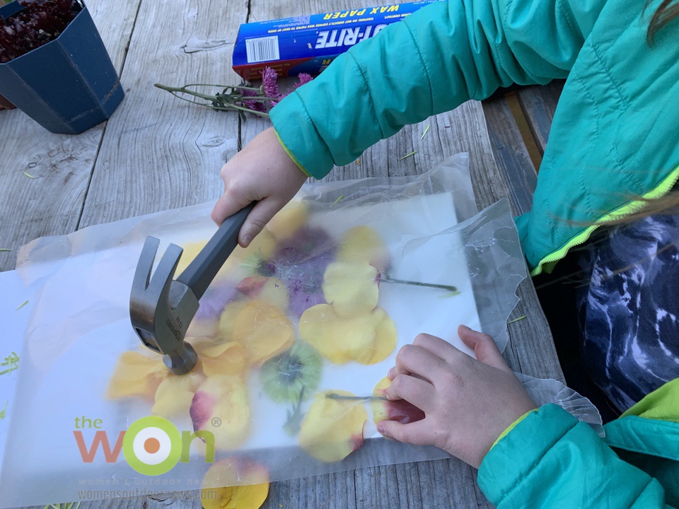 pounding diy flowers with hammer