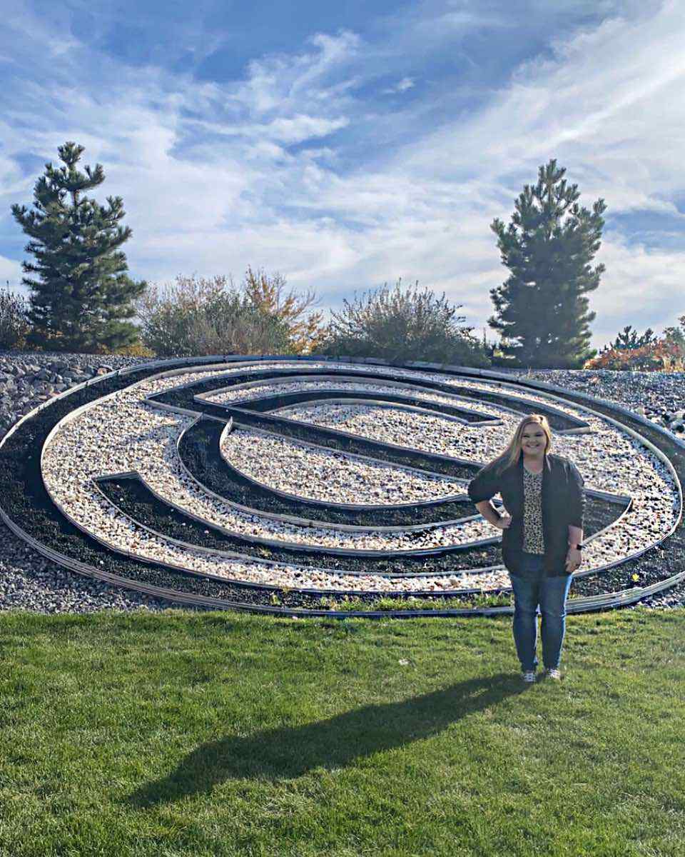 Brooklee Grant in front of SilencerCo logo Utah