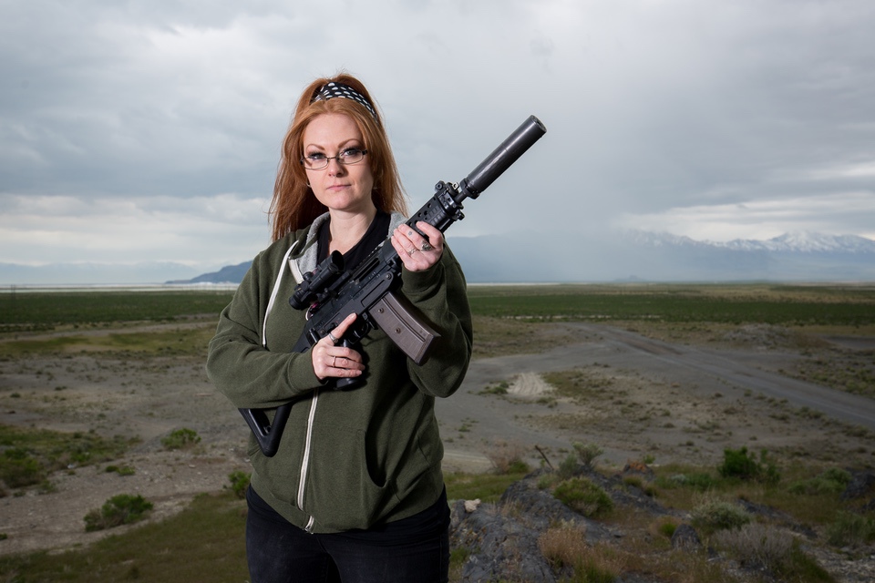 woman outside with silencerco on AR Female Initiative