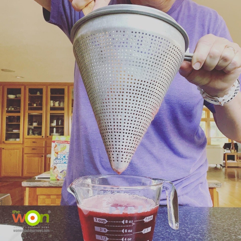 pressing strawberry sage syrup