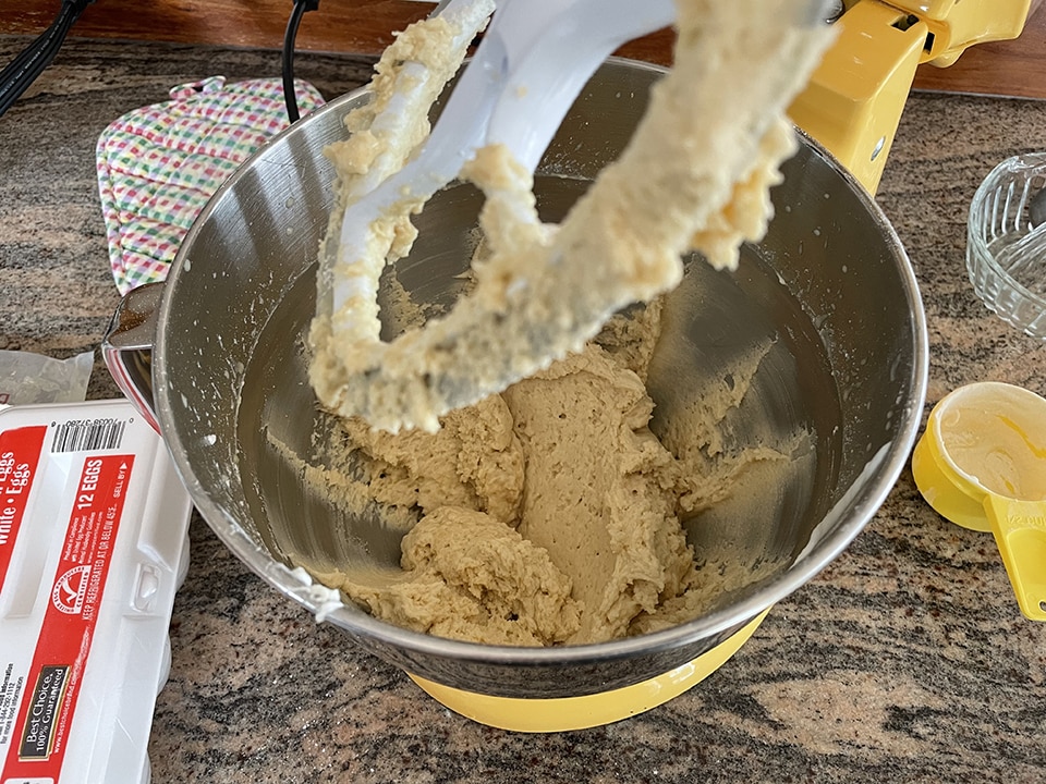 Adding dry ingredients to cake batter