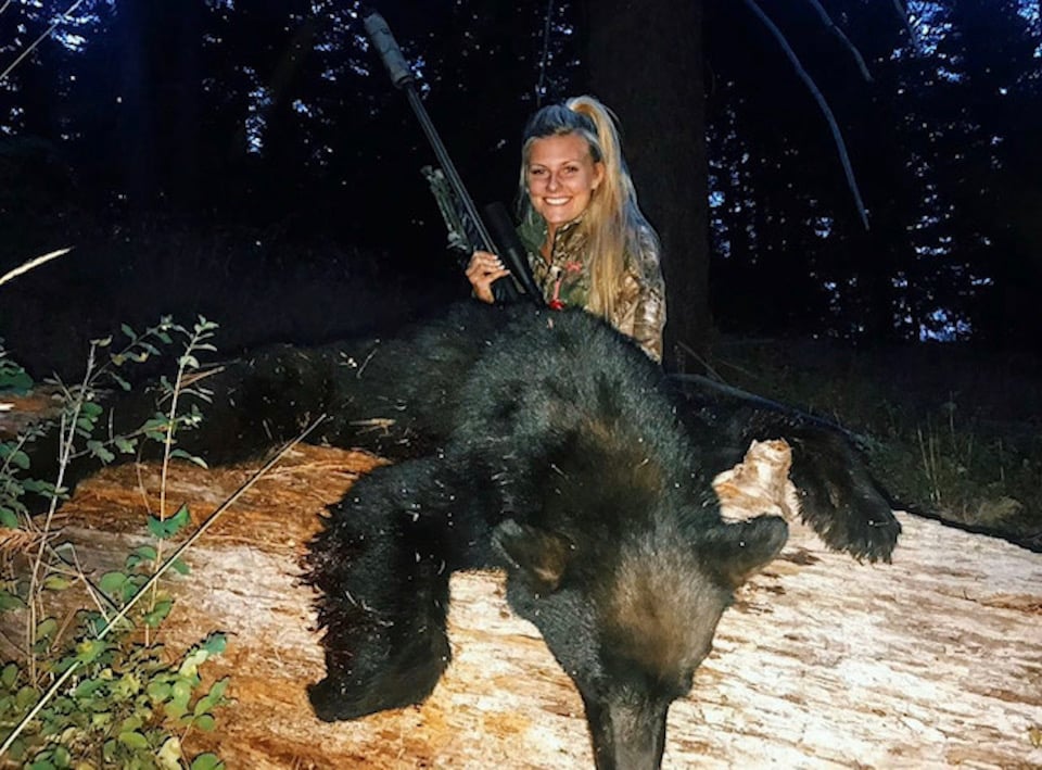 Harvested Bear with a Suppressor