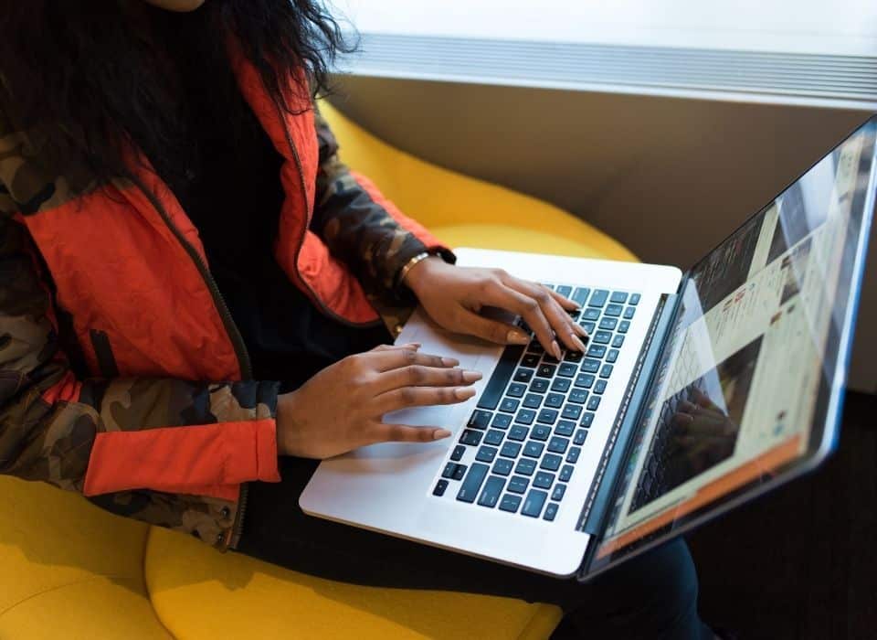 woman on computer researching Safety Plan