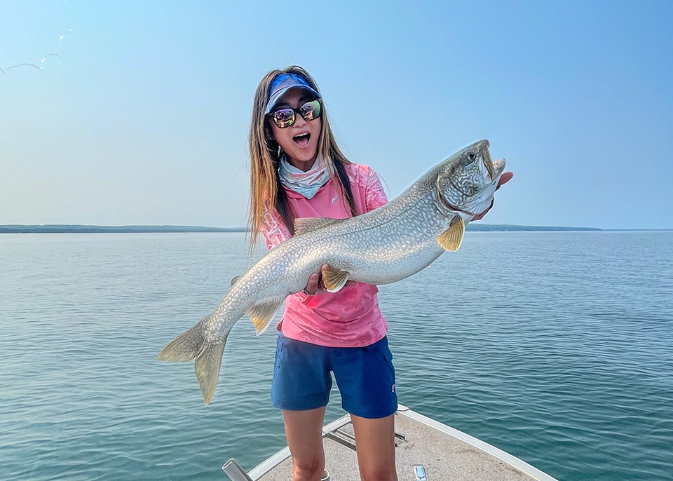 Jenny with lake trout on Lake Superior