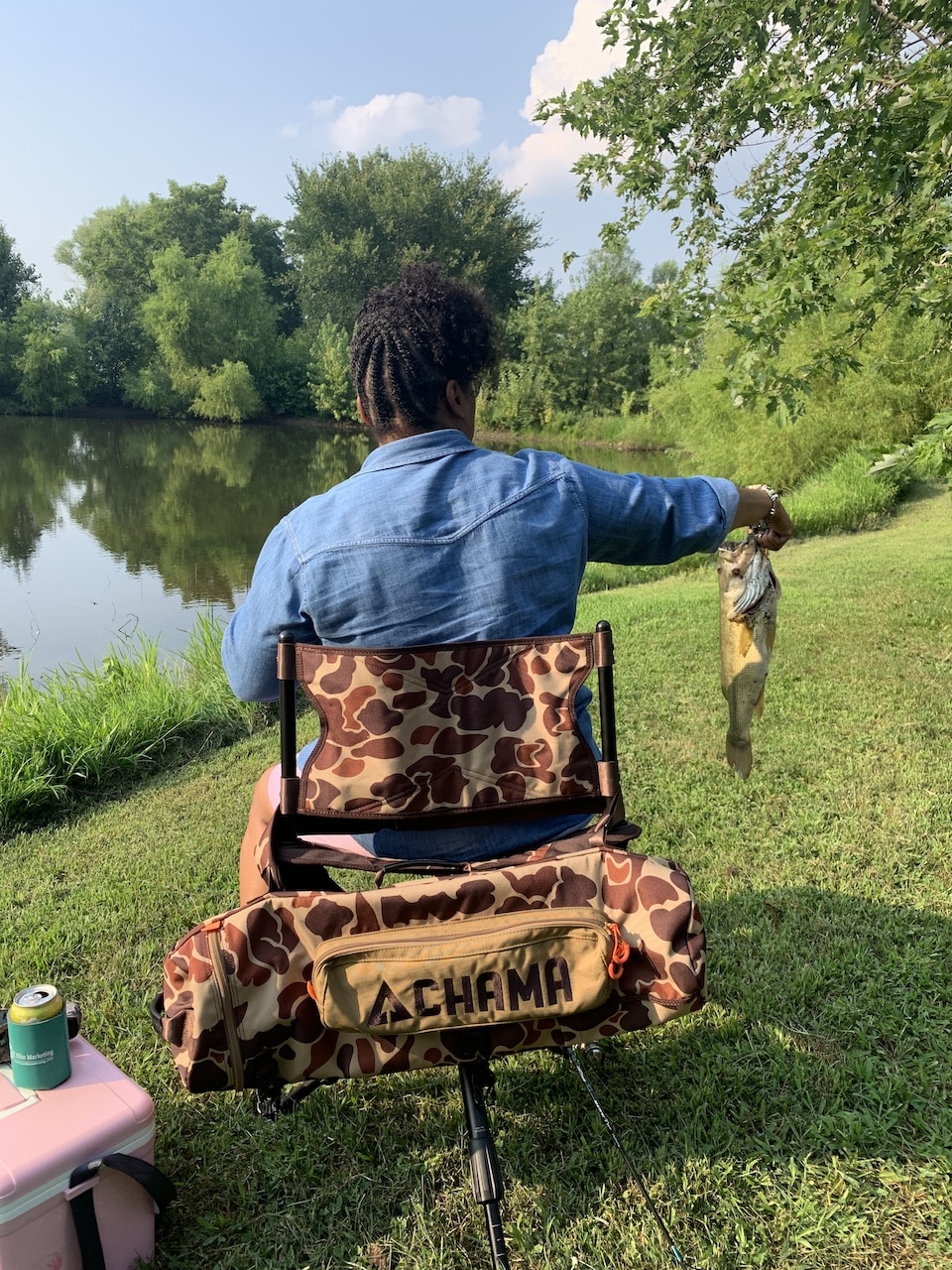 Sharenda caught a bass in her CHAMA Pursuit Chair