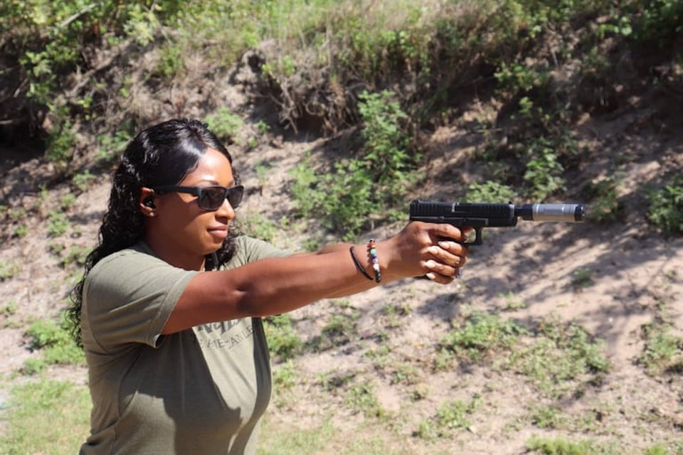 Avery Skipalis shooting a GLOCK 44 with a SilencerCo Switchback 22 attached Avery Skipalis Talks SilencerCo Suppressors for Teaching