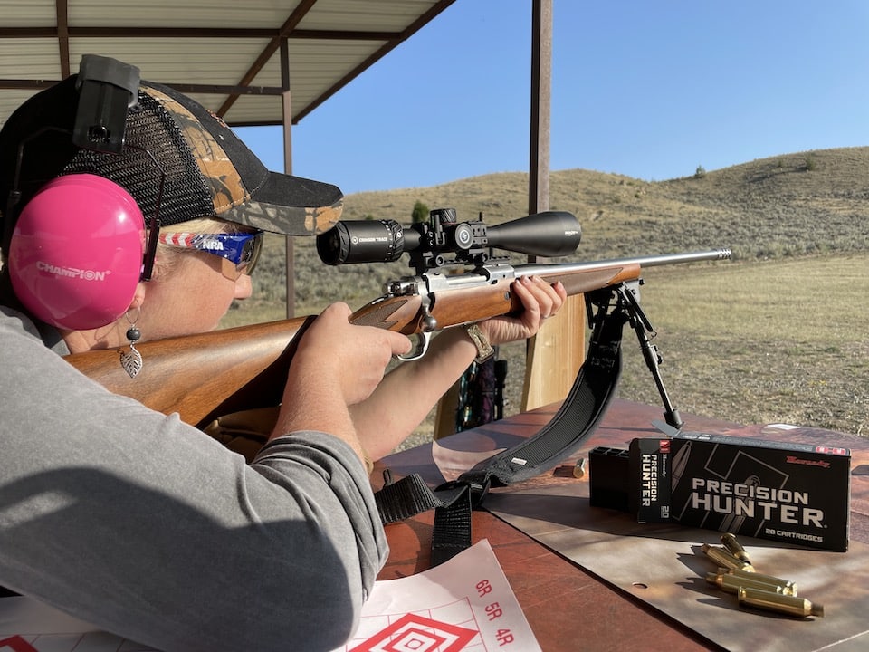 Sally Pruiett trying out the Hawkeye Deer Hunting Rifle Calibers