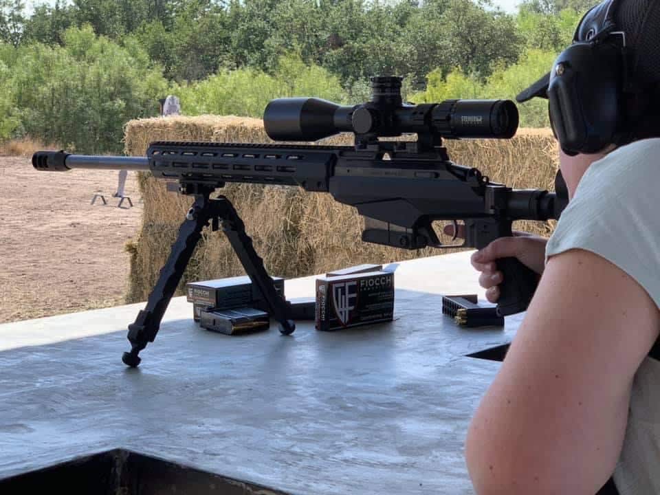 lady sighting rifle