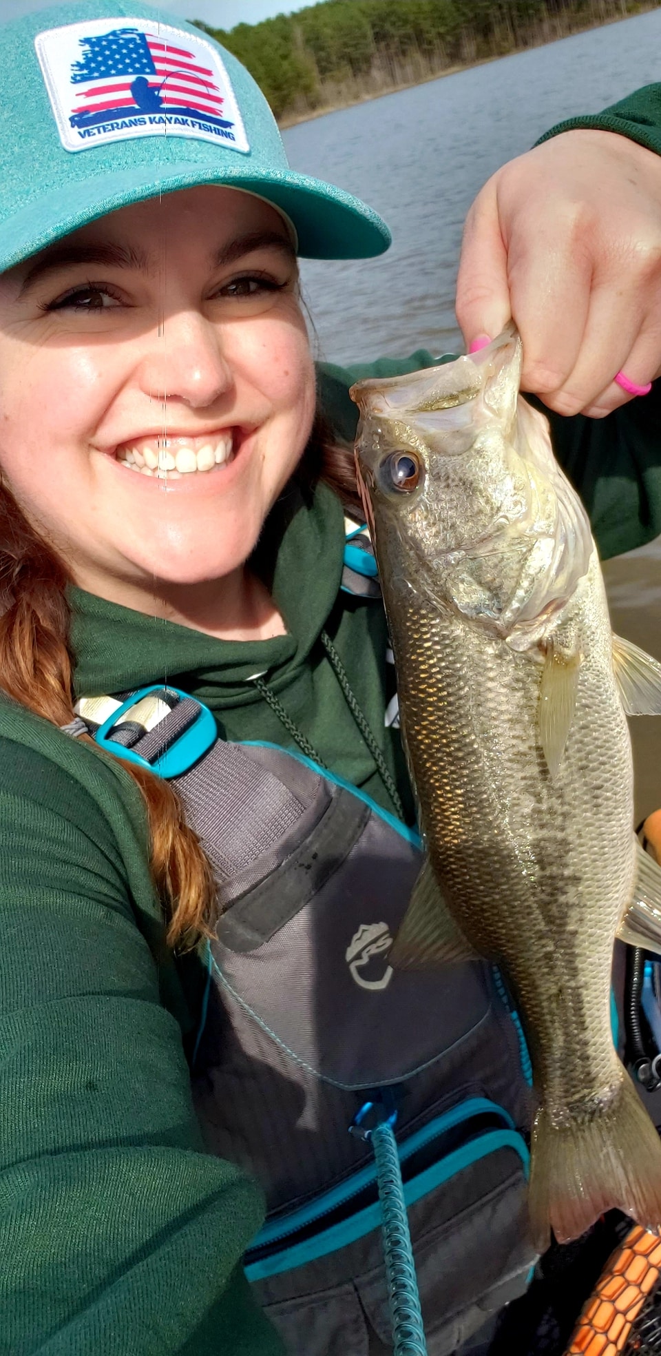 Happy smile Catherine Ragsdale with fish