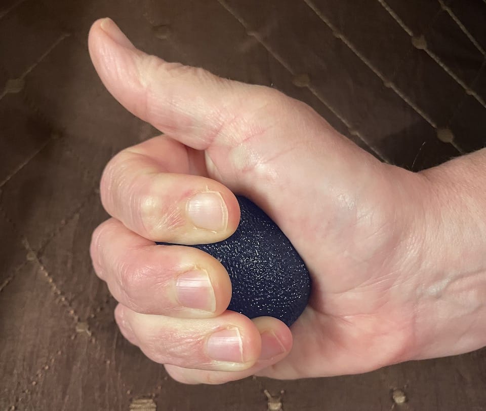 press your fingers into the ball, straight into your palm