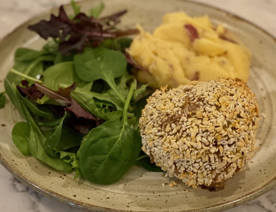 Scotch eggs with a salad and tatties