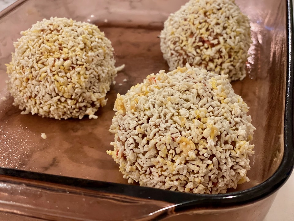 The Scotch eggs are ready for the oven