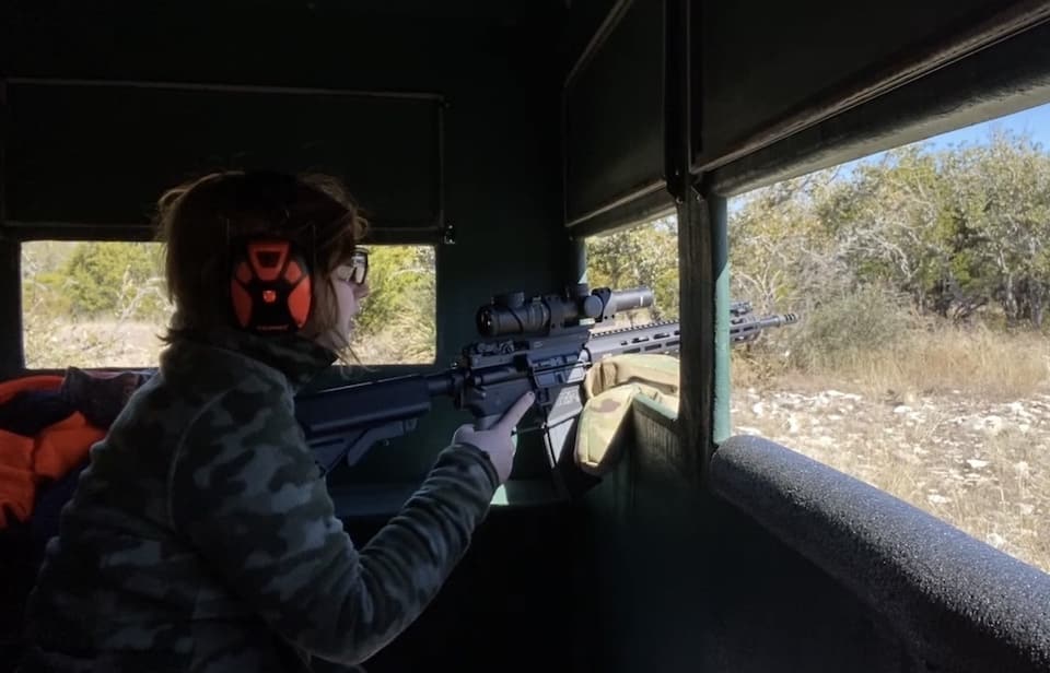 Anna sits patiently in the blind