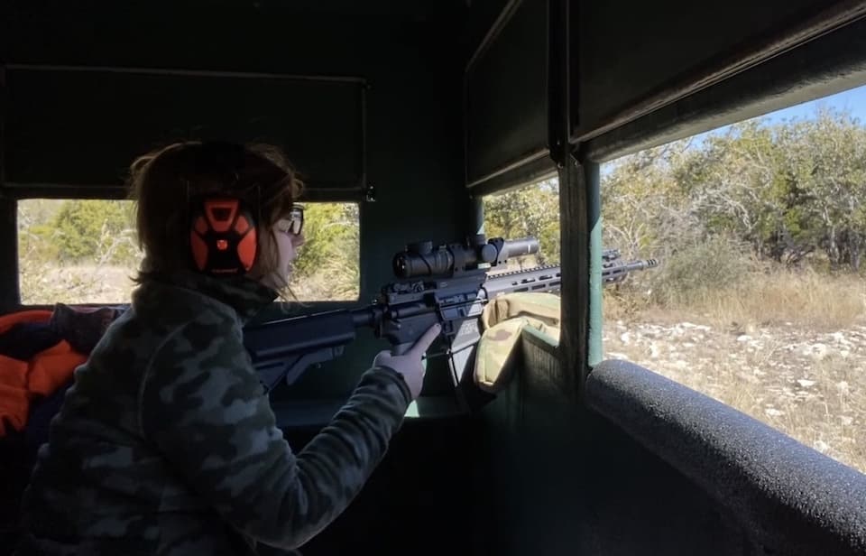 Anna sits patiently in the blind