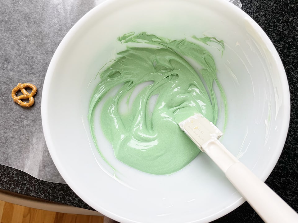 Shamrock Pretzel Treats adding green food coloring